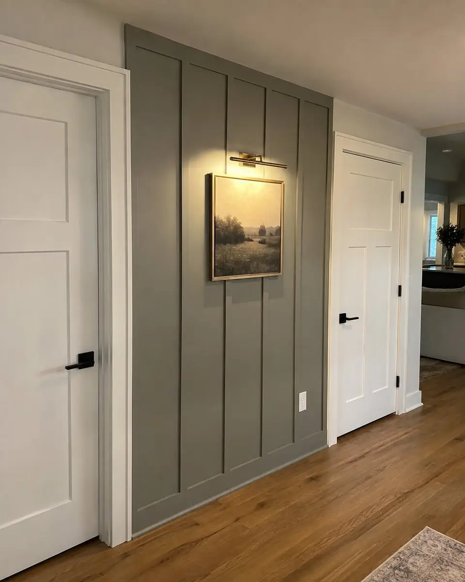 Gray board and batten accent wall between two white interior doors